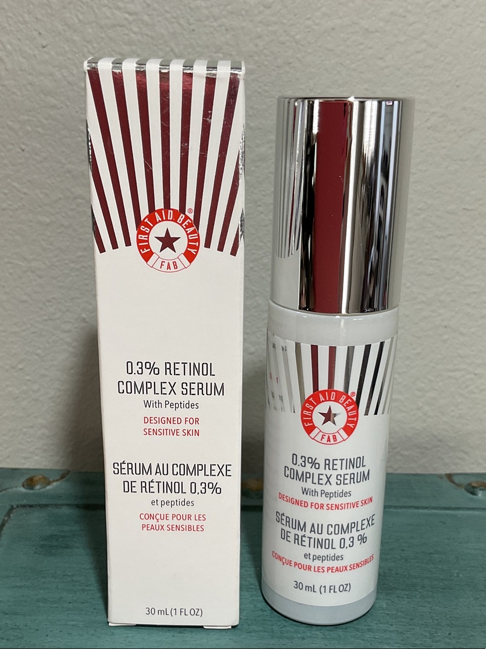 First Aid Beauty Retinol Complex Serum in White and Red Packaging